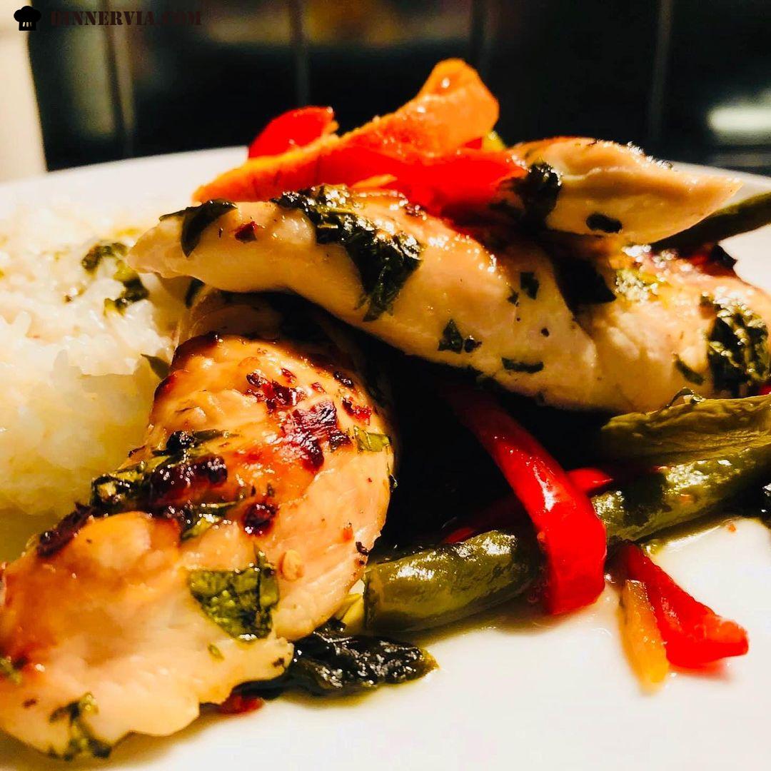 Orange and Basil Chicken served with green beans red peppers