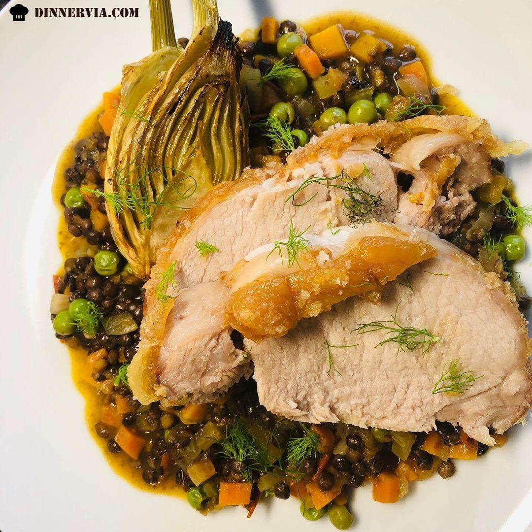 Roast pork and fennel with braised green lentils vegetables