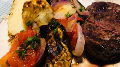 Fillet steak with smoked aubergine tomatoes n onions parcel
