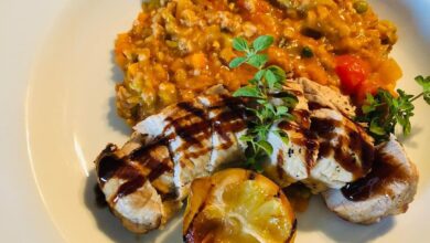 Griddled Pork with Spelt garden herb tomato risotto and charred