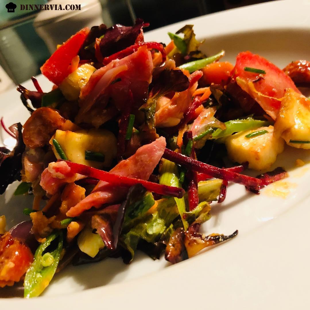 Bacon chorizo haloumi warm salad with winter leaves roasted