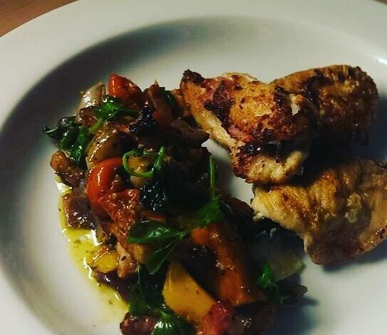 Saltimbocca chicken with roasted Mediterranean vegetables pea shoots Greek oliv
