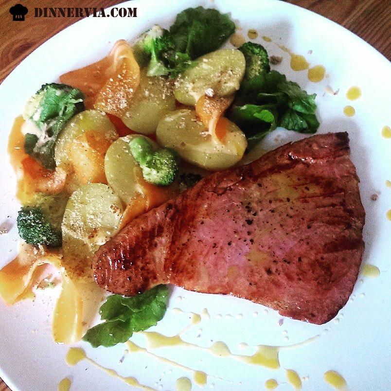 Seared Tuna steak with warm salad of Jersey royals carrot