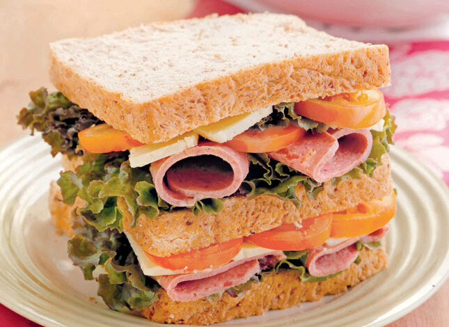 hearty cold cut sandwich with veggies 645x480